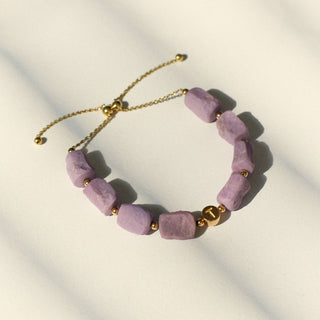 Rareté Studios Belonging Bracelet with purple Phosphosiderit gemstones and 18ct yellow gold letter bead